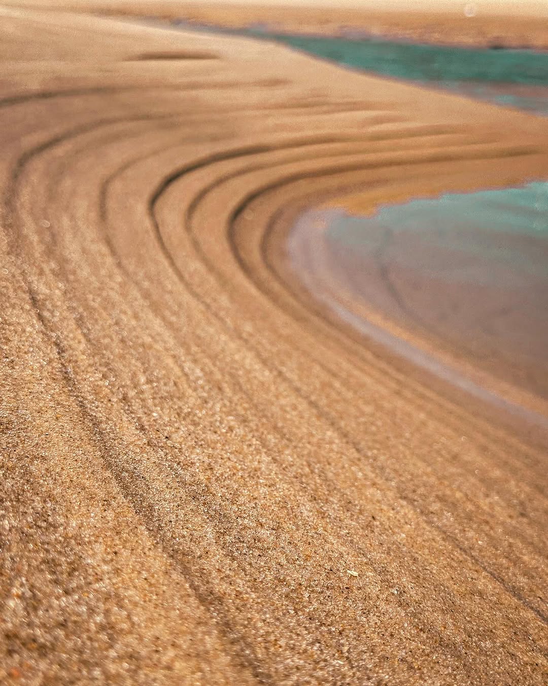Ondas na areia
